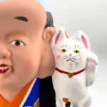 招き猫抱き福助／津屋崎人形